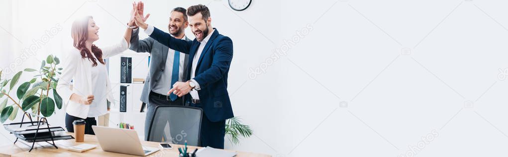 Consultant reviewing financial charts with a small business owner